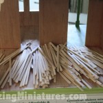 Setting out the craft sticks for the hardwood flooring process