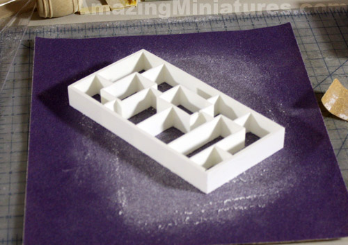 Sanding down the resin cast - Miniature Modern Bookshelf