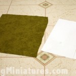 Cutting out the proper fabric area to get ready for using the spray adhesive