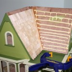 Gluing on the Coventry Cottage roof